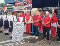 Kadisdik Dampingi Wali Kota Lepas Lomba Gerak Jalan Tingkat  SMP/MTs se-Kota Lubuklinggau